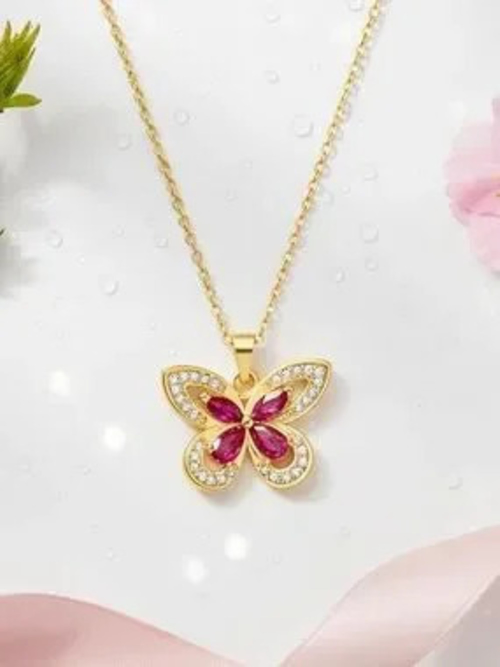 Anthropologie Gold Butterfly Necklace with Pink Gemstones